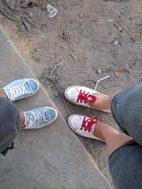 Volunteers' tennis shoes outside the hospital.
