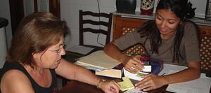Conversation Corps member tutoring a host mom.