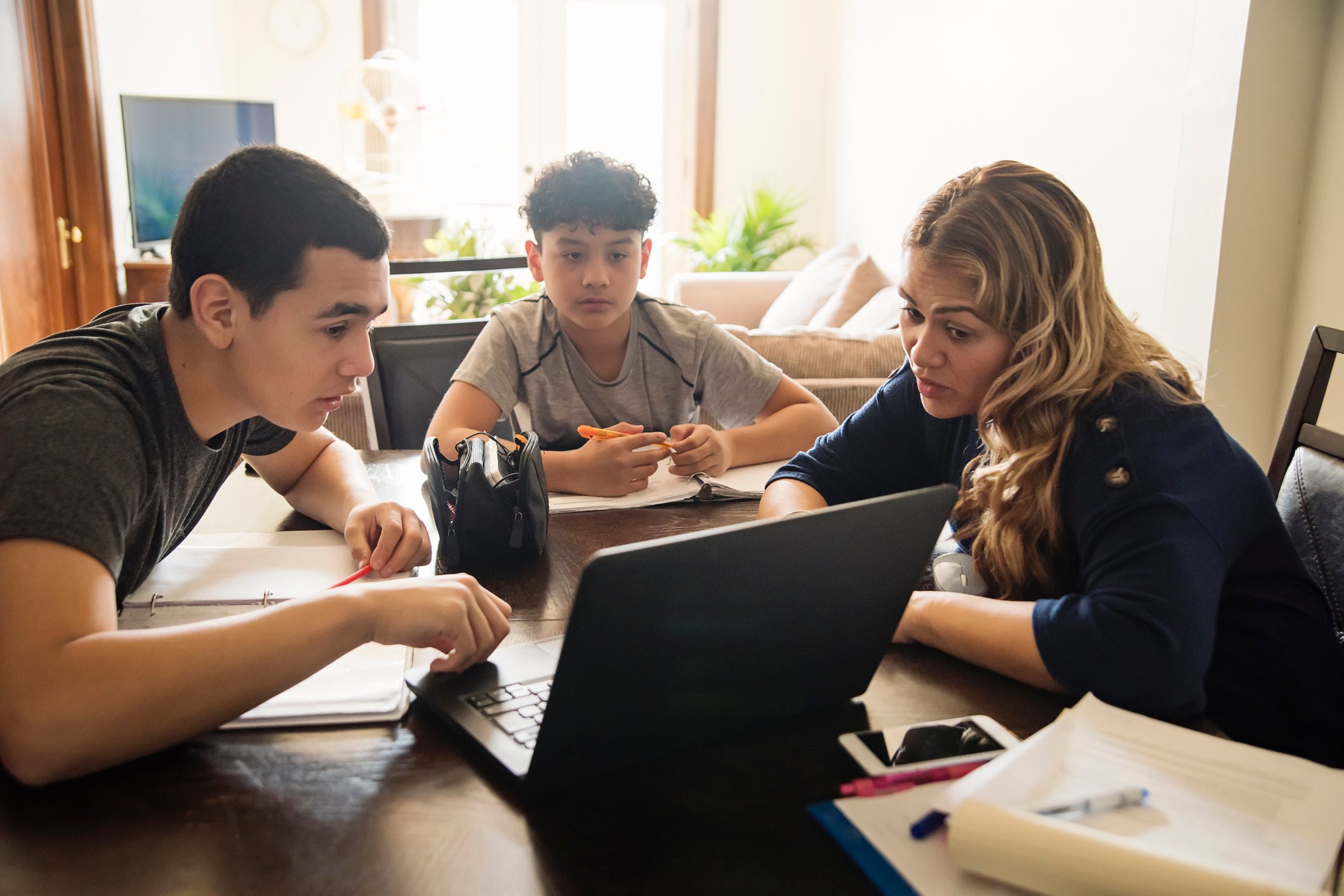 an English tutor on a Cultural Exchange Project program tutoring her host siblings some conversational English