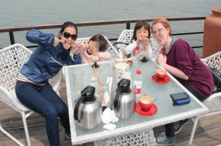 au pairs with their host siblings in China