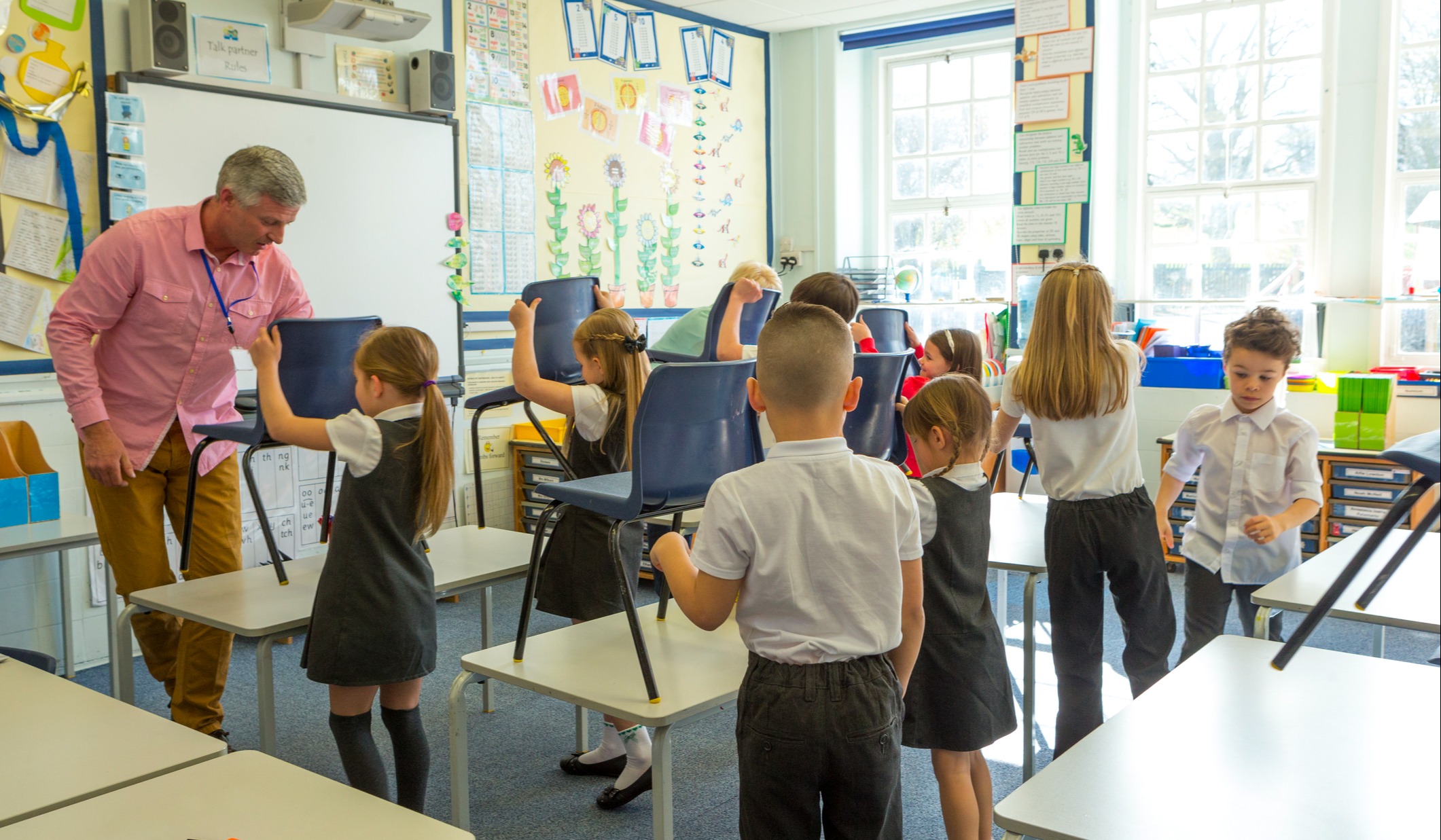 A teacher from The Cultural Exchange Project teaching in a classroom abroad