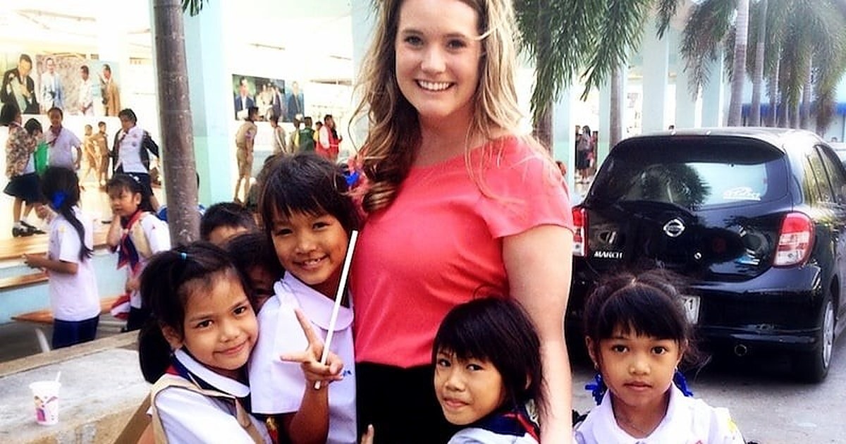 A Cultural Exchange Project teacher with her students at a Thai school.