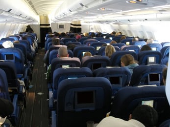airplane interior with passengers