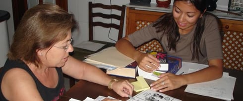 a homestay English tutor helping her host mom learn English