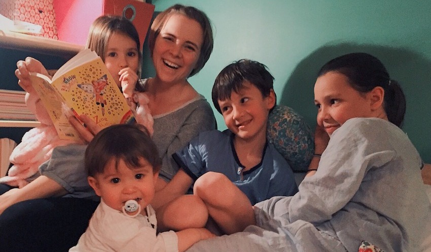 an au pair with her 4 host siblings having a great time